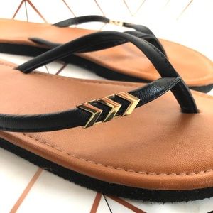 Leather flip flops with gold chevron detail